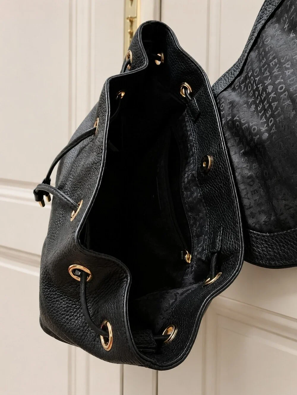 Kate Spade New York Black Pebbled Leather Mini Backpack Gold Tone Drawstring